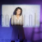 08-06-2004 Karin de Groot at studio in Amsterdam, by order of KRO. 

[keywords]Posed, Half Length, Smiling[/keywords]